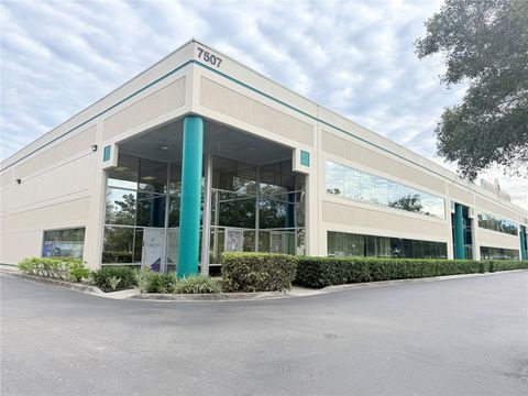 Photo of 7507 Kingspointe Parkway #106, Orlando, FL 32819 (MLS # O6381798)