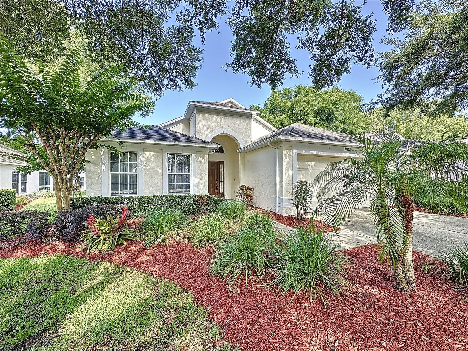 Price Reduced by $10,000. Rare Sherwood model priced to sell in the 55+ gated golf community of Kings Ridge. Located in the rolling hills of Clermont this home has 1418 heated SF with 2 BD/2 BA and a 2 car garage. Large Great room 17 X24 that can be used as a large family room or family room / dining room combo. The home has just been painted a nice neutral color throughout the home. Home has a galley style kitchen and a separate breakfast nook. New range & dishwasher in the kitchen. New roof in July 2018 and the HVAC is new as of Feb 2021. The primary bathroom has a walk in shower. There is a separate laundry room and the new washer & dryer will remain. The oak tree in the back has been removed. Kings Ridge is a 55 Plus gated golf community located in the rolling hills of Clermont, FL. Enjoy the Royal life style in the multi-million $ clubhouse with 3 heated pools, spas, tennis & pickle ball courts, billiards, shuffle board, shows, Bingo, cards and clubs galore. The monthly maintenance fees include: lawn maintenance including trimming of shrubs, care of irrigation system & irrigation water, internet, TV & home phone thru Opticaltel, maintenance of roads and outside painting of home every 7 years. Take your golf cart to the Kings Ridge Plaza where you can do your grocery shopping, banking or dining out.