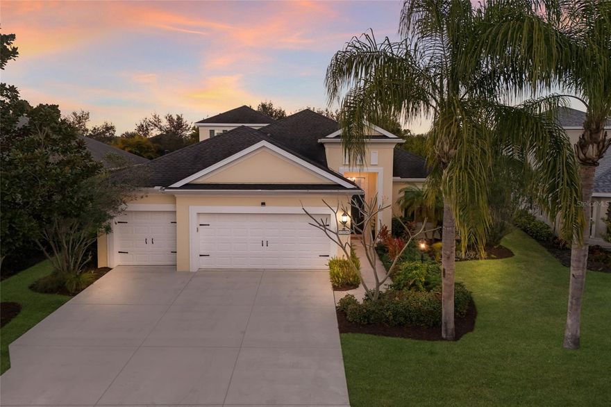 Welcome to 12026 Forest Park Circle in beautiful Bradenton, tucked inside the heart of Lakewood Ranch, where everyday living feels elevated.
This is the highly sought-after Clear Day model by Neal Communities, and you’ll understand why the moment you walk through the door. The layout flows effortlessly ,open, bright, and designed for the way people actually live. Whether it’s slow mornings with coffee or hosting a full house, the space simply works.
There’s a dedicated OFFICE that feels focused and inviting, effortlessly chic and perfect for deep work. Upstairs, a spacious bonus room with built-in surround sound and its own half bath creates the ultimate flex space for movie nights, guests, or a private retreat.
Designer details are layered throughout. Accent walls add warmth and personality. A custom fireplace anchors the living space. Every light fixture was intentionally selected to make a statement. Custom plantation shutters downstairs add both elegance and function.
The kitchen has been enhanced with a recently custom-built walk-in pantry, blending beauty with everyday practicality.
The primary suite feels like a private sanctuary. A custom walk-in closet makes organization feel luxurious. The spa-inspired bath features dual vanities, a soaking tub, Roman walk-in shower, private water closet, and even a Kohler Moxie music shower head for a true spa-at-home experience. Two of the bathrooms are equipped with upgraded smart bidet toilet seats, adding an extra layer of comfort and modern convenience.
Step outside and the lifestyle continues. Set on a partial pond lot, the large scenic lanai overlooks tranquil water views. The heated pool and jacuzzi make it perfect for year-round enjoyment and entertaining. Electric roller shades provide privacy and comfort at the touch of a button.
Function meets peace of mind with all windows replaced, hurricane shutters for windows and doors, plus premier second-story protection with convenient interior crank access. Brand new A/C systems, a Nest thermostat, EV charger, and Chamberlain MyQ smart garage system complete the modern upgrades.
The third garage is insulated and air-conditioned, currently serving as a home gym, but ready to adapt to your needs.
Located in highly coveted Central Park, known for its parks, tennis court and pickleball, soccer field, dog parks, splash pad, playgrounds, and regular community events, all within close proximity to A-rated schools, shopping, dining, fitness centers, and everything Lakewood Ranch has to offer.
If you’ve been searching for a Lakewood Ranch pool home with BONUS ROOM, office, pond view, heated pool, home gym, designer upgrades, smart home features, and hurricane protection this one checks every box.
Turnkey furnishings available for buyers seeking a seamless, move-in ready experience.