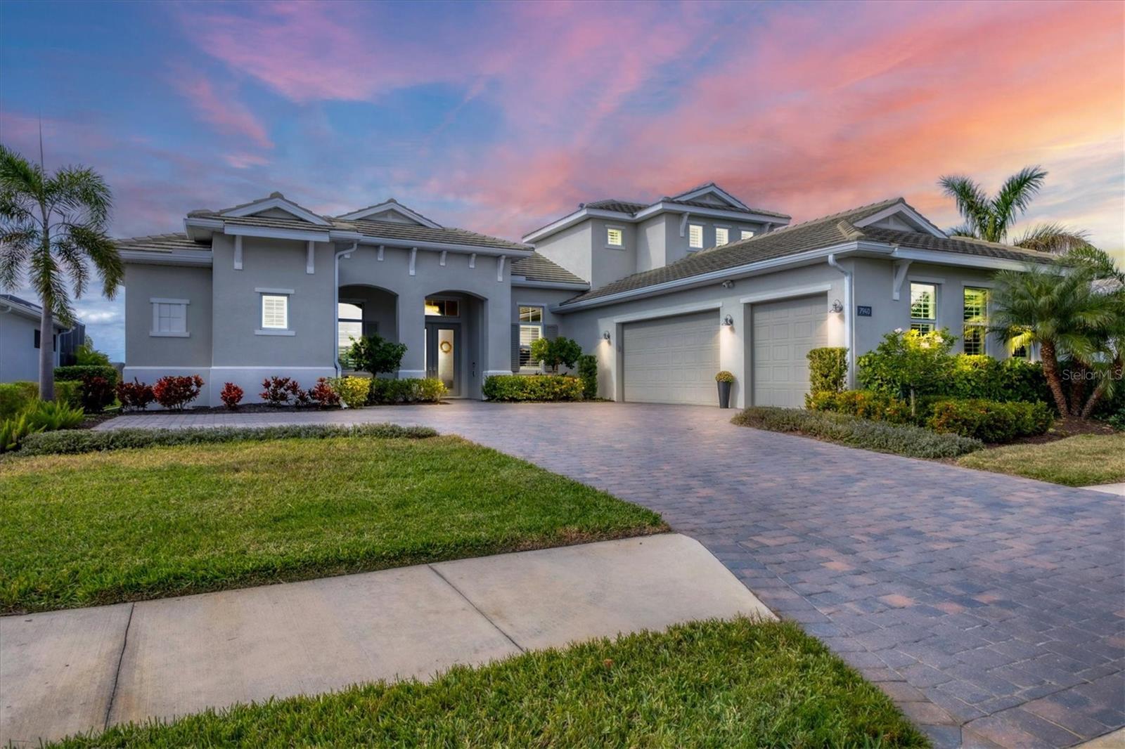 New Price: Now Offered at $1,299,000 – Fully Furnished & Must Sell
This is your chance to own a move-in-ready luxury home on one of the most oversized and private preserve lots in The Isles at Lakewood Ranch.
Sellers are highly motivated and ready for a quick close.
7940 Redonda Loop offers 3,441 sq ft of thoughtfully designed living space, including 3 bedrooms, 4.5 bathrooms, a private office, and a spacious upstairs bonus loft with a full bath. The open-concept layout is loaded with premium upgrades—impact windows and doors, LED lighting, tray ceilings, and oversized tile flooring throughout.
The gourmet kitchen features quartz countertops, stacked cabinetry, high-end appliances, a walk-in pantry, and a large island ideal for entertaining.
Step outside to your own private resort: a heated saltwater pool, lush landscaping, and an expansive screened lanai with both covered and open-air lounging areas.
The primary suite offers two custom walk-in closets and a spa-style bathroom, while each additional bedroom features its own en-suite for ultimate guest comfort.
With a 3-car side-load garage, extended paver driveway, custom laundry room, and full designer furnishings, this home delivers exceptional value—outshining new construction in both price and finishes.
Priced well below comparable pool homes—this opportunity won’t last. Schedule your private showing today.