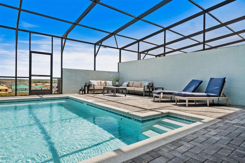 Photo of 617 Jasmine Lane, Davenport, FL 33897 (MLS # O6377051)