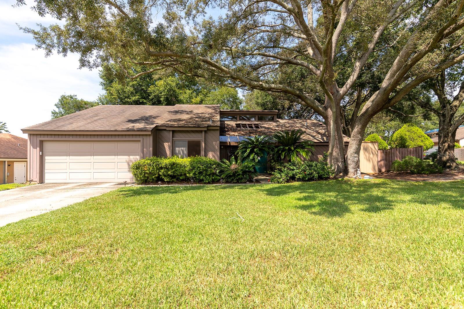 Welcome to this spacious, lovely 3-bedroom, 2-bathroom pool home nestled on a huge corner lot in the peaceful community of Sheeler Oaks. The home has been thoughtfully maintained by one owner all these years! This home offers a warm and inviting atmosphere with a great split bedroom floor plan perfect for privacy. The master bedroom opens directly onto a PRIVATE COURTYARD, so you can create your own peaceful hideaway. The master bathroom is a true retreat, featuring a glass-enclosed standing shower and a soaking tub. The living room features vaulted ceilings and so much natural light flowing throughout. The updated kitchen boasts stainless-steel appliances, all wood cabinets, and granite. The dining room has a wonderful, large pass-through area from the kitchen to make serving meals quick and easy. The grand living room features a wood-burning fireplace to warm you on chilly February nights. The large screened patio and pool deck is perfect for big get-togethers, quiet morning time, or simply enjoying our beautiful year-round weather. Beyond the pool deck, there is still so much space to play in the yard.
A brand new roof (2025) and hot water heater (2025) will be installed prior to closing, offering added peace of mind. Centrally located, this home is just minutes from beautiful parks, shopping, dining, and top-rated schools. With quick access to major highways, getting where you are going is a breeze.
With your special touches, this could be your perfect family home for years to come