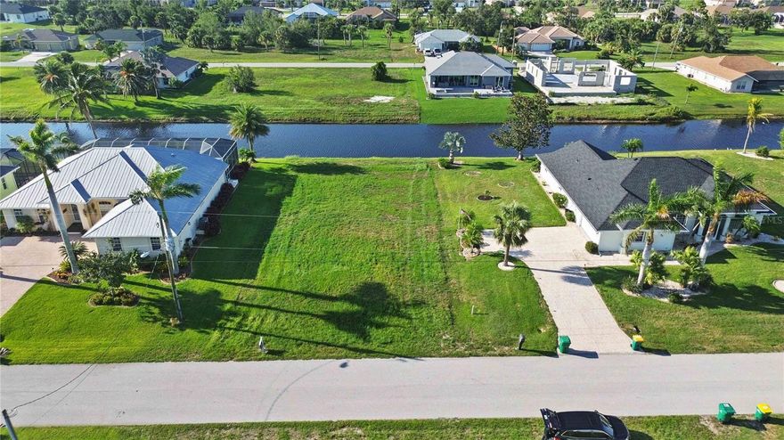 Stunning Waterfront Lot in Rotonda West, Florida | Prime Location with Breathtaking Views!

Welcome to 97 Medalist Rd, where nature meets luxury in the serene enclave of Rotonda West. This vacant waterfront lot presents an incredible opportunity to build your dream home in one of the most sought-after locations in Florida. Nestled in a prestigious neighborhood, this prime piece of land offers an idyllic setting surrounded by natural beauty and captivating water views.

Situated on the tranquil shores Rotonda River, this exceptional property spans 80' x 125', providing ample space to bring your vision to life. Whether you desire a cozy retreat or a spacious family haven, this blank canvas awaits your creative touch. Imagine waking up to panoramic vistas of glistening water, vibrant sunsets, and the gentle sounds of nature, offering a tranquil escape from the bustling world.  The strategic location of this waterfront gem ensures easy access to a plethora of amenities and recreational activities. Take advantage of the nearby world-class golf courses, pristine beaches, and renowned fishing spots, all within a short distance. Experience the laid-back Florida lifestyle as you soak up the sun, go boating, kayaking, or simply unwind in the embrace of the gentle sea breeze.

Rotonda West is renowned for its welcoming community, ensuring a warm and friendly atmosphere for residents and visitors alike. Enjoy the convenience of local shops, restaurants, and entertainment options that cater to every taste. With a range of parks, nature trails, and wildlife sanctuaries, you'll have endless opportunities to explore and appreciate the natural wonders of the area.

Key features of this vacant waterfront lot include:

Unparalleled waterfront location in Rotonda West, Florida
Expansive 80' x 125' of land
Spectacular panoramic views of the water
Close proximity to world-class golf courses, beaches, and fishing spots
Welcoming community with local amenities and entertainment options
Abundance of parks, nature trails, and wildlife sanctuaries nearby
Don't miss out on the chance to own this extraordinary waterfront lot in Rotonda West. Embrace the Florida lifestyle and create a residence that exceeds your every expectation. Whether you envision a private oasis or an entertainer's paradise, this property offers endless possibilities. Contact us today to seize this rare opportunity and make your dreams a reality!