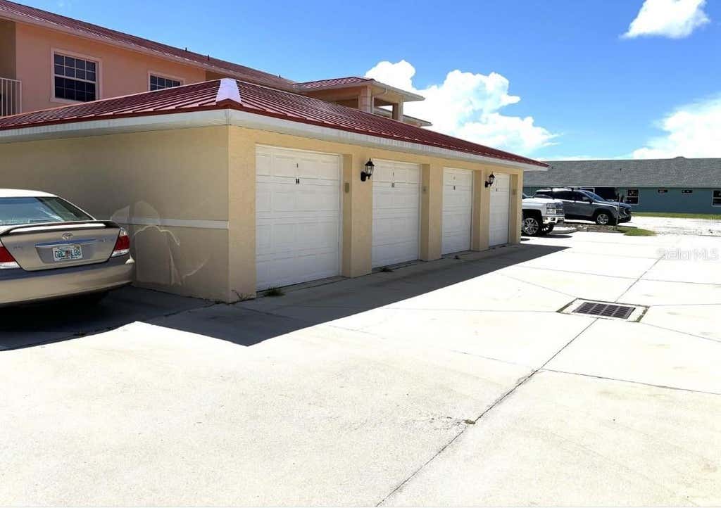 Photo of 242 Boundary Boulevard #111, Rotonda West, FL 33947 (MLS # D6147767)