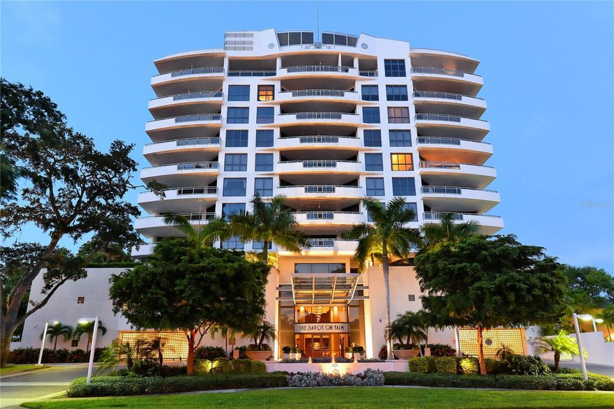Discover an exquisite oasis in the prestigious Savoy in Sarasota, an intimate, amenity-rich community of just 24 units in sought-after downtown. This remarkable 3BR, 4th floor corner residence lives like a private single-family home with thick, virtually sound-proof walls, 270 degrees of stunning city, Bay and Gulf views, 3 large balconies, a private 2-car garage and other remarkable features that make it simply incomparable. Inside, you'll find an inviting living space filled with natural light and a welcoming ambiance, thanks to high ceilings, all new cashmere-stained maple hardwood floors throughout and expansive windows. Each of the 3 bedrooms boasts a walk-in closet and full bath, with one currently configured as an office and one as a den. The stylish, modern kitchen is a chef's dream, featuring state-of-the-art appointments and a large island with kitchen sink with a motion sensor faucet, built-in soap dispenser, and hot/cold filtered water dispenser. With complementing wood grain tile floors, the 3 terraces provide ample outdoor space with east, south or west views. Enjoy shaded evenings in the summer, colorful sunsets during fall, winter, and spring, and spectacular 4th of July fireworks from your balcony. The Savoy staff is always kind and welcoming, and the community is resplendent with resort conveniences, including a rooftop deck with summer kitchen, a lower deck with summer kitchen, gas grills, private massage/treatment room, private lounge, pool, fitness center plus a 1BR/1BA guest suite. Delight in the vibrancy of your downtown location, with E-bike and scooter ride-share options just steps away, a Saturday farmers market 2 blocks away, and weekly arts festivals and boat shows within 2 blocks during the season. Furnishings and artwork available outside the real estate.
