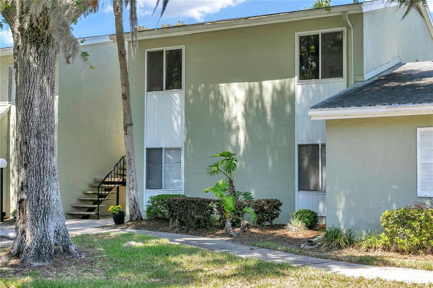 Second-floor condo in The Fairways at Silver Springs Shores offers 1,031 sq ft of low-maintenance living with an assigned parking space and a screened porch. The electrical panel was replaced in September 2024, water heater in 2020, and toilets in 2022. The AC unit was replaced in 2016 and the roof in 2019, with roof maintenance covered by the HOA. Washer and dryer are included in the sale. Monthly HOA fee covers cable TV, community pool access, pool maintenance, exterior building maintenance, grounds maintenance, and trash removal. The Country Club at Silver Springs Shores — an 18-hole public golf course — is less than 0.5 mi away on Silver Rd. Publix, Walmart, and Aldi are all within approximately 2.5 mi via SR-464. Silver Springs Shores Community Center, with a pool, tennis, and basketball courts, is approximately 1.0 mi away. Downtown Ocala is approximately 10 mi northwest.
