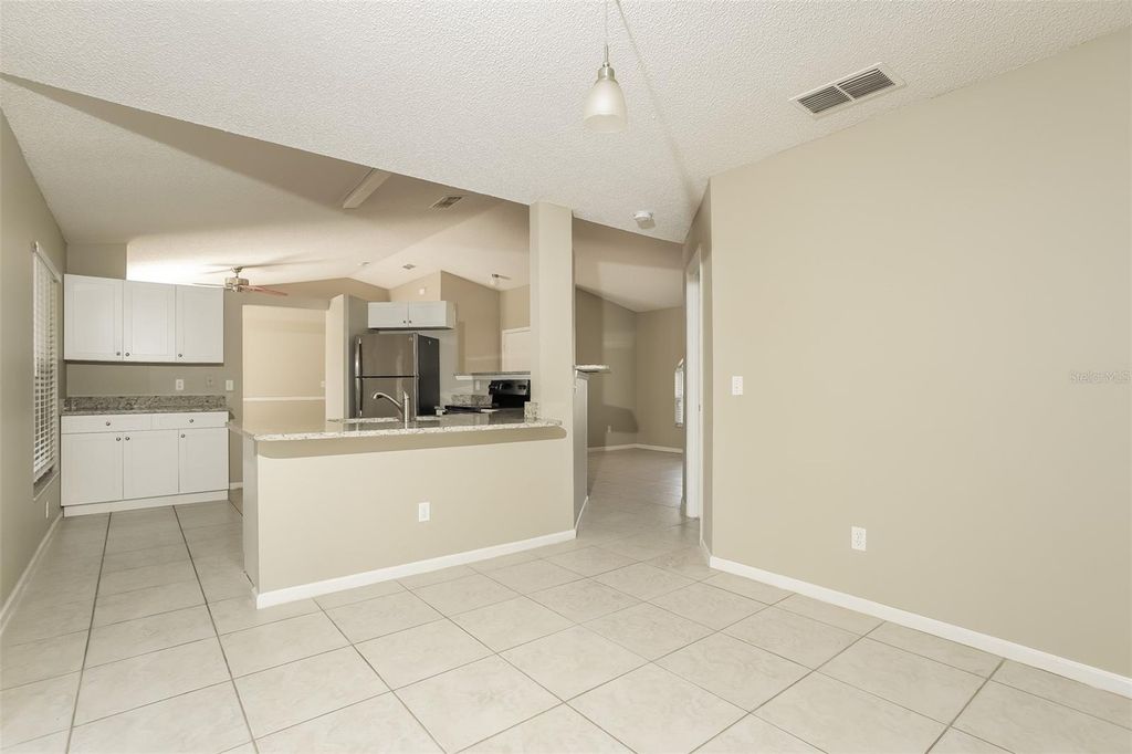 Photo of 557 Oak Branch Circle, Kissimmee, FL 34758 (MLS # O6399849)