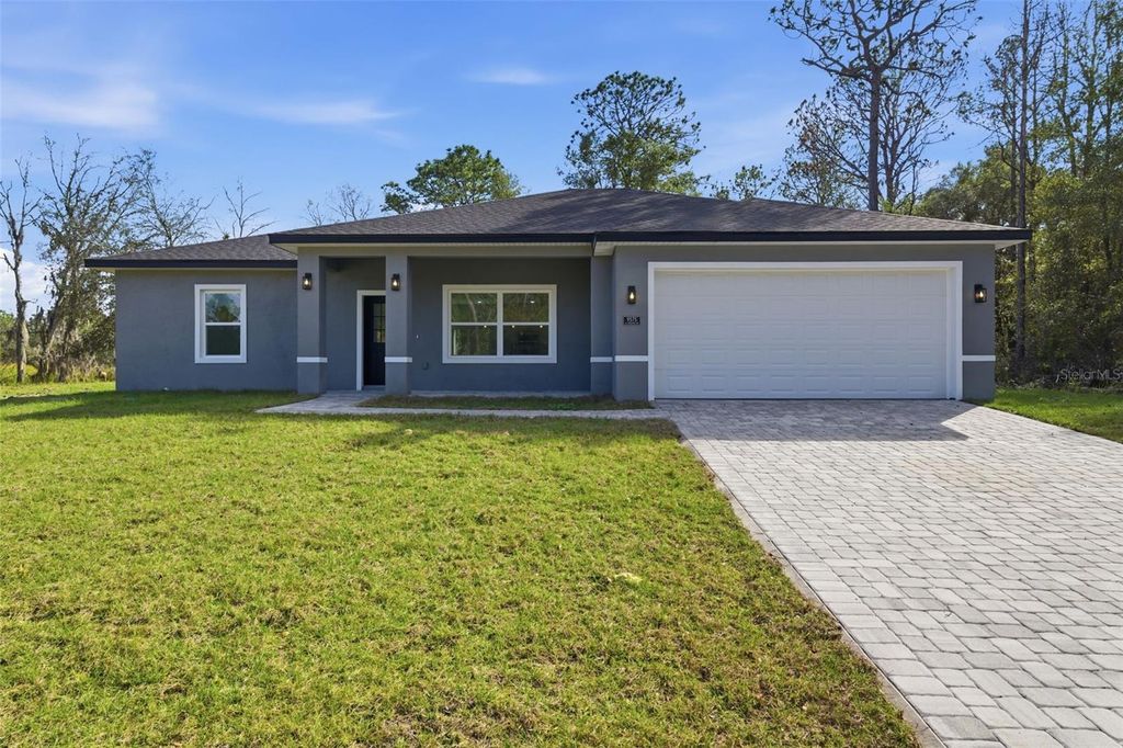 Photo of 9575 N Langdon Road, Citrus Springs, FL 34434 (MLS # O6372554)
