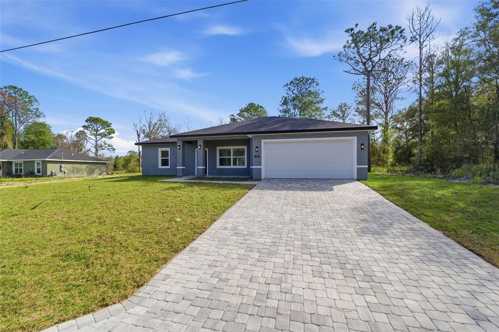Photo of 9575 N Langdon Road, Citrus Springs, FL 34434 (MLS # O6372554)