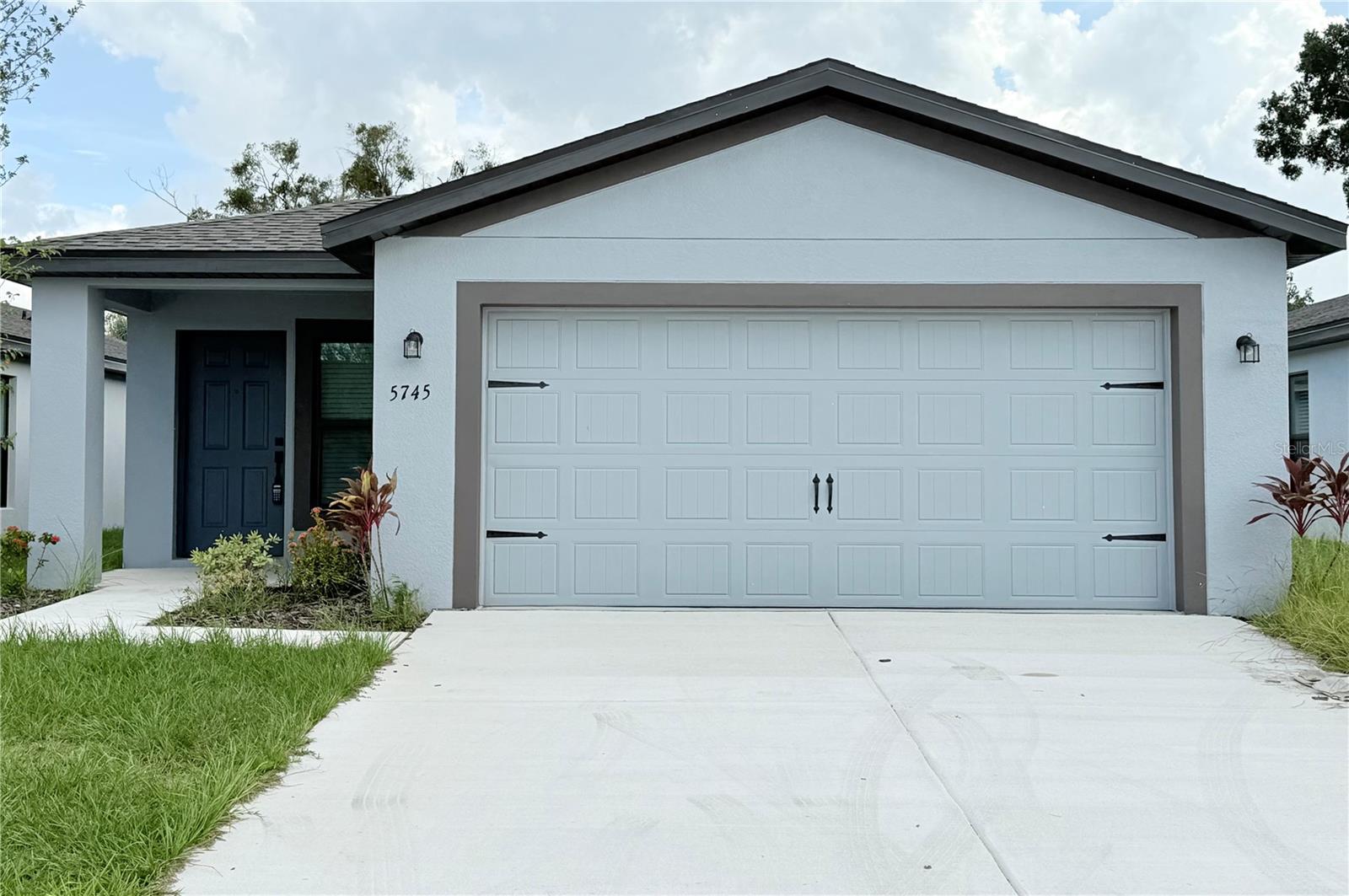 Discover this stunning 3-bedroom, 2-bath new construction home in Tampa, offering 1,707 sq. ft. of modern living space and a spacious 2-car garage. Built in 2024, this pristine property features an open floor plan, high ceilings, and luxury finishes. The gourmet kitchen boasts brand-new stainless steel appliances—refrigerator, microwave, conventional oven, and dishwasher. A dedicated laundry closet provides washer/dryer hookups for added convenience.
Never lived in or rented, this home is truly move-in ready. Ideally located just minutes from Downtown Tampa, with quick access to dining, shopping, entertainment, and major highways. Perfect for buyers seeking a new home in Tampa with style, comfort, and a prime location.
