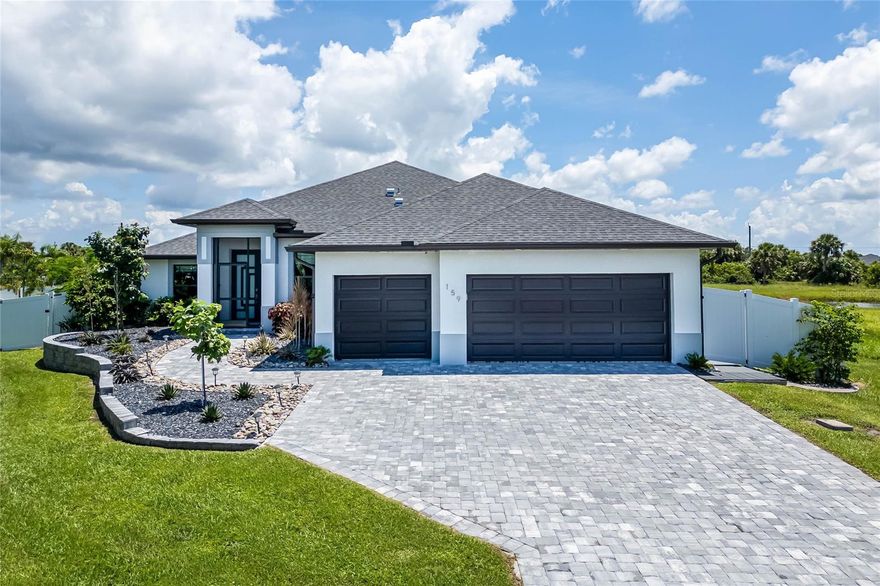 One or more photo(s) has been virtually staged. Welcome to your Florida dream home on a cul-de-sac in the desirable community of Rotonda Heights, where style, comfort, and convenience come together. This nearly new 4-bedroom, 2.5-bath residence offers a thoughtfully designed open floor plan with 2,071 sq. ft. of living space, highlighted by tile floors throughout for a clean, modern feel. The kitchen is the heart of the home, featuring stainless steel appliances, granite counters, and soft-close cabinetry. The light-filled living and dining areas flow seamlessly to the outdoors, creating the perfect setting for entertaining or simply relaxing in your own private retreat. Step outside and experience Florida living at its best. The backyard is fully fenced and beautifully landscaped with custom details, providing both beauty and privacy. Enjoy your heated saltwater pool and spa year-round, complete with an outdoor shower—a true oasis after a day on the boat or golf course. Peace of mind comes built in with impact windows and doors, plus a whole house stand-by generator ensuring comfort in any weather. Every detail has been carefully considered, from the elegant granite surfaces to the custom-designed closets.  The primary bathroom has a dual vanity, large walk-in shower, and a Japanese soaking tub. Set on a private lot with lush landscaping, this home offers the ideal combination of seclusion and convenience. You’ll be just minutes from everything Southwest Florida has to offer, including marinas for boating and fishing, Gulf beaches, casual and fine dining, scenic hiking and biking trails, and numerous championship golf courses. Whether you’re into relaxing by the pool, exploring the outdoors, or spending time on the water, this home puts it all within easy reach.
Don’t miss the opportunity to make this exceptional property your forever home or seasonal getaway. With its combination of luxury, functionality, and an unbeatable location, it’s ready to welcome you to the Florida lifestyle you’ve been dreaming of!!