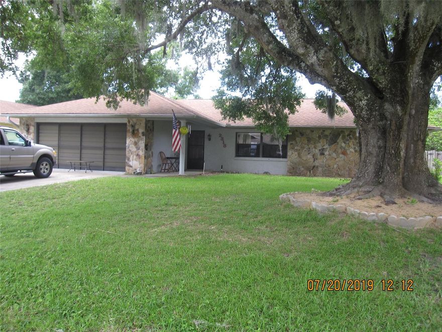 FIRST TIME OFFERED FOR SALE!  LARGE 3 BEDROOM, 2 BATH CONCRETE BLOCK HOME, 1855 SQFT LIVING AREA. FEATURES INCLUDE SPACIOUS LIVING ROOM, COZY KITCHEN WITH BREAKFAST BAR, 11 X 18 FAMILY ROOM WITH WOOD BURNING FIREPLACE, SLIDING GLASS DOORS IN FAMILY ROOM OPEN TO LARGE SCREENED-IN PORCH, FENCED-IN BACKYARD WITH ABOVE GROUND POOL, SPLIT BEDROOM PLAN, INSIDE LAUNDRY ROOM WITH BUILT-IN PANTRY, 2 CAR GARAGE, BEAUTIFUL MATURE OAK TREE IN FRONT YARD. NEEDS A LITTLE TLC. ;Water: City