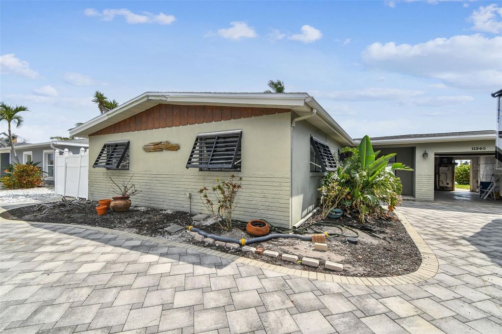 Photo of 11340 5th Street E, Treasure Island, FL 33706 (MLS # TB8381031)