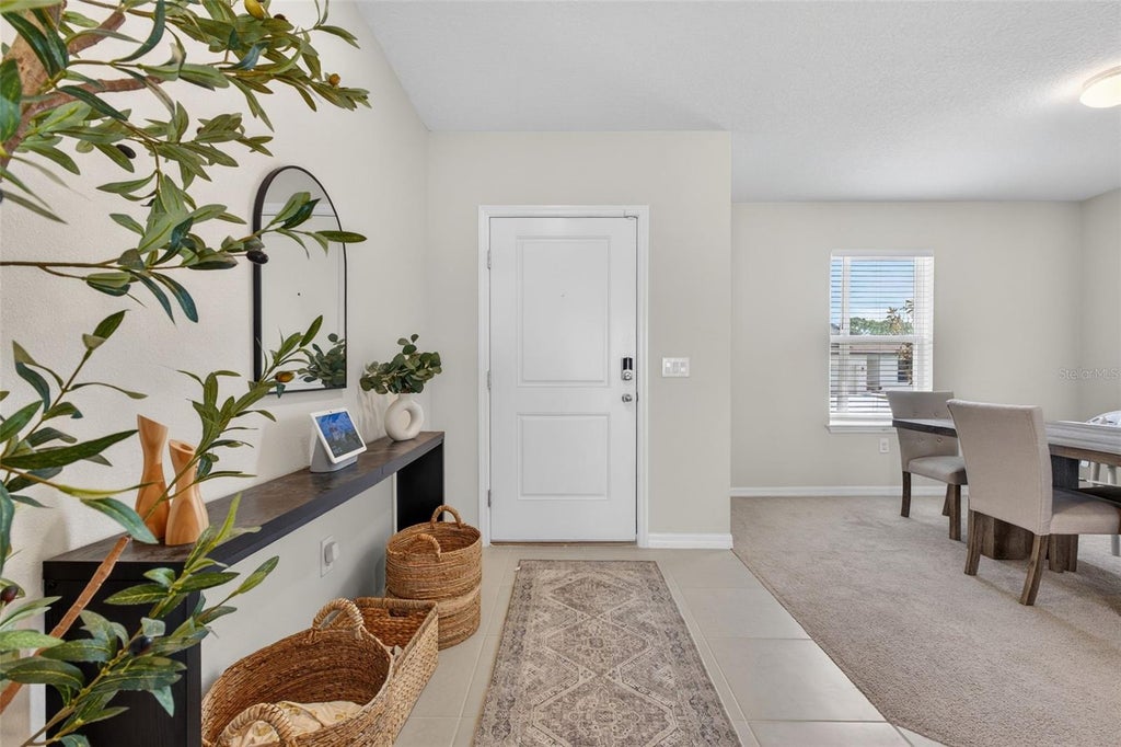 Photo of 1117 Michelangelo Lane, Winter Haven, FL 33884 (MLS # O6444798)