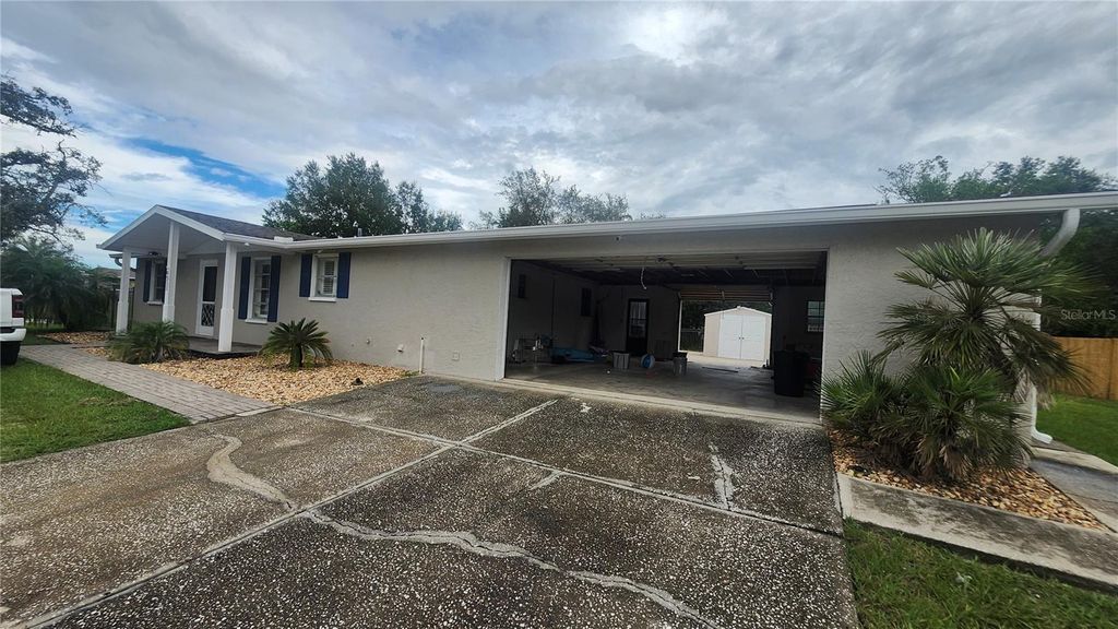 Photo of 9311 River Road, Spring Hill, FL 34608 (MLS # TB8427660)