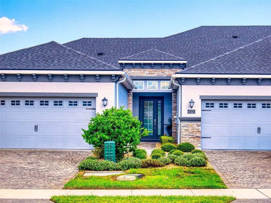 Your dream home in a gated community. The Blossom II is a concrete block construction Villa with brick paver driveway and walkway. This 2 STORY Villa features a 2-Car Garage, 3 Bedrooms, 3 Full Bathrooms, and ceramic tile throughout main living areas. Kitchen includes 42-inch CABINETS w/ under cabinet lighting, pull outs, tile backsplash, GRANITE COUNTERTOPS and has High-end GE Stainless-Steel appliances create a kitchen that is as beautiful as it is functional. Main flooring is all tile and easy to maintain including the master bedroom and it features a large walk-in closet, bath has two sinks with large vanity with QUARTZ COUNTERTOPS, private water closet, large tile shower with bench. The Blossom II has 10' CEILINGS, recessed lighting & 8' doors. COVERED SCREENED LANAI with large ceiling fan and provide plenty of natural light throughout the home. Enjoy a leisure lifestyle in this luxury villa where you do not need to worry about any yard maintenance. Perfectly situated in the heart of Port Orange, it's located in one of the county's top-rated school districts, offering the perfect combination of comfort, luxury, and convenience. The home is filled with upscale touches, including custom-built walk-in closets, window treatments, recessed lighting throughout, and much more. This stunning Blossom model comes with premium upgrade GE appliances that go beyond what typical builders grade. It features two overhead garage storage racks, The backyard opens to a wide, peaceful space, providing more privacy than other homes. Plus, there's ample storage, both under the stairs and on the second floor. With top-rated schools, shopping, and dining just minutes away, this home is located for ultimate convenience. Medical facilities close by, including Advent Health’s freestanding ER, and a new Halifax Hospital ER.