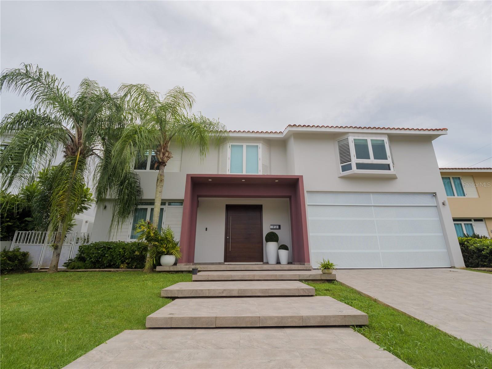 Paseo San Juan- Los Paseos. Fully Remodeled and Equipped Home in the Exclusive Community of Los Paseos with 5 bedrooms, 3 1/2 bathrooms, living room, kitchen, dining room, family, laundry, garage for two cars, 36,000kw electric generator, 40 solar panels, 3 Tesla batteries, terrace with bar area and pool. Amenities: - Double controlled access - 24/7 Security (including patrols) - 6 Tennis courts - 2 Pickle Ball courts - Fitness center - Two-story gazebo - Swimming pool - Soccer field - Dog park - Walking trail.