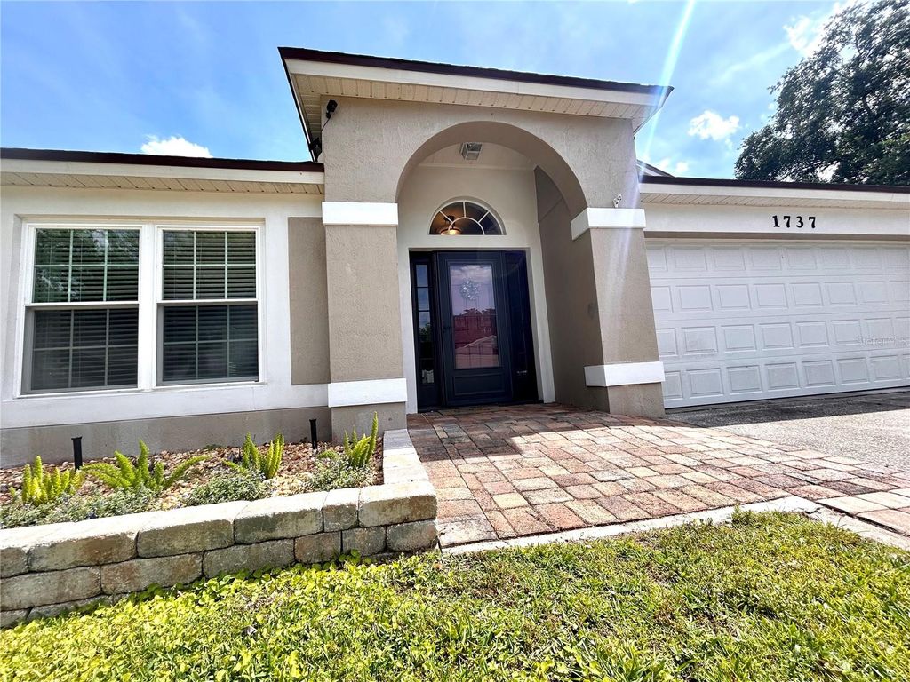 Photo of 1737 Setting Sun Loop, Casselberry, FL 32707 (MLS # FC318238)