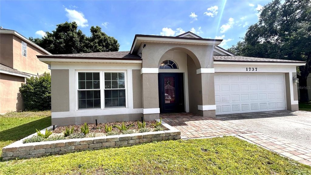 Photo of 1737 Setting Sun Loop, Casselberry, FL 32707 (MLS # FC318238)