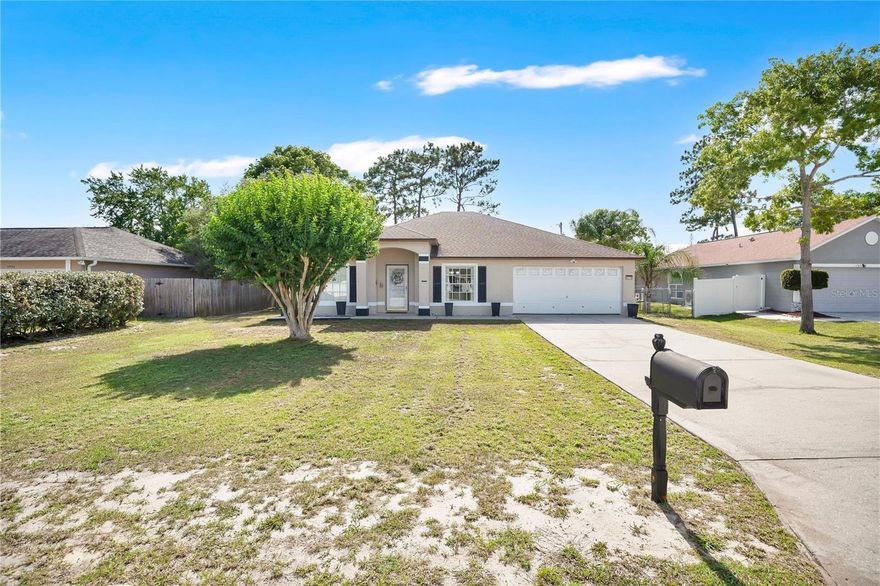 Welcome to 1779 Meredith Avenue in the heart of Deltona — a beautifully maintained 3-bedroom, 2-bath home featuring huge vaulted ceilings and a spacious open floor plan that creates a bright, airy, and inviting atmosphere throughout. Designed with both comfort and entertaining in mind, the home offers generous living areas, updated finishes, and a seamless flow between the kitchen, dining, and main living spaces. Recent upgrades, including new exterior lighting and thoughtful improvements throughout, enhance the home’s charm and curb appeal, while the oversized screened lanai and fenced backyard provide the perfect place to relax and enjoy the Florida lifestyle. Conveniently located near shopping, dining, parks, trails, and major highways with easy access to Orlando and Daytona Beach, this property is ideal for buyers looking to enjoy the affordability, growth, and everyday convenience that continue to make Deltona one of Central Florida’s most desirable places to call home.