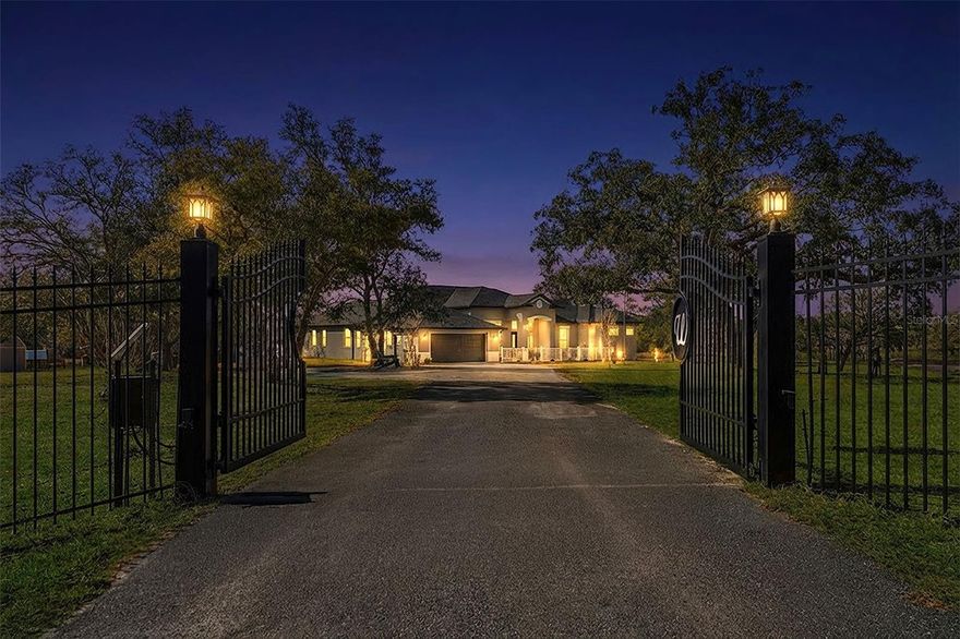 Welcome to this exceptional private retreat! Built in 2022 and situated on just under 10 fully fenced acres at the end of a quiet dead-end street, this 5-bedroom POOL home boasting 3500 heated square feet offers the perfect blend of modern luxury and peaceful country living. Located in a non-flood zone and zoned Agricultural, this property provides peace of mind with the flexibility for livestock, farming, and potential Greenbelt tax benefits. A private electric double gate welcomes you onto this beautiful property. Upon entering the home, pocket sliding glass doors span the back wall filling the space with natural light, creating a bright, open, airy atmosphere that enhances the home’s seamless flow. A living space and dining area sit just off the entry, creating an inviting layout that’s functional and ideal for entertaining. Designed with a split floor plan, the spacious primary suite features TWO walk-in closets with built-in shelving. The spa-like ensuite bath has dual vanities, granite countertops, a private water closet, linen closet, soaking tub, and an oversized walk-in shower with dual heads. The second bedroom is conveniently located just off the primary suite with a connecting door—ideal for a nursery, home office, or flex space.  Across the home, the third and fourth bedrooms are generously sized with access to the second bath that offers an exterior door leading to the pool area. The fifth bedroom alone spans over 730 sq ft offering incredible versatility with its own private entry from the pool deck—perfect for a hobby room, homeschool classroom, theater room, or potential in-law suite. The chef inspired kitchen is truly the centerpiece of the home. With a massive 6-burner gas stove with oven and a pot-filling faucet, this kitchen has both function and style. The additional built-in wall oven and microwave combo provide extra cooking capacity for entertaining. With granite countertops, large center island, and breakfast bar, this kitchen truly offers exceptional storage, workspace, and flow. Step outside using one of the two sliding glass pocket doors to enjoy the screened-in saltwater pool with expansive deck space for lounging and grilling. Beyond the enclosure, a large wraparound deck overlooks the property and includes a hot tub. A brick-paver path leads to a gazebo and firepit area with ample seating. The property is thoughtfully equipped with a full home generator, water softener, central vacuum, and owned propane tank that service the stove, water softener, pool deck grill line, and gives a connection for a future pool heater. With almost 10 acres Zoned AG, this property offers eligibility for Greenbelt classification, which may provide significant property tax savings for qualifying agricultural use. With a corral, two large sheds, multiple chicken coops and runs, and large open acreage, the property is ready to support livestock, farming, or other pursuits. Located just 10 minutes away from an abundance of shops, restaurants, and main roads, this location is more than ideal. This exceptional property offers land, privacy, a newer home, and a pool, all in one incredible package.