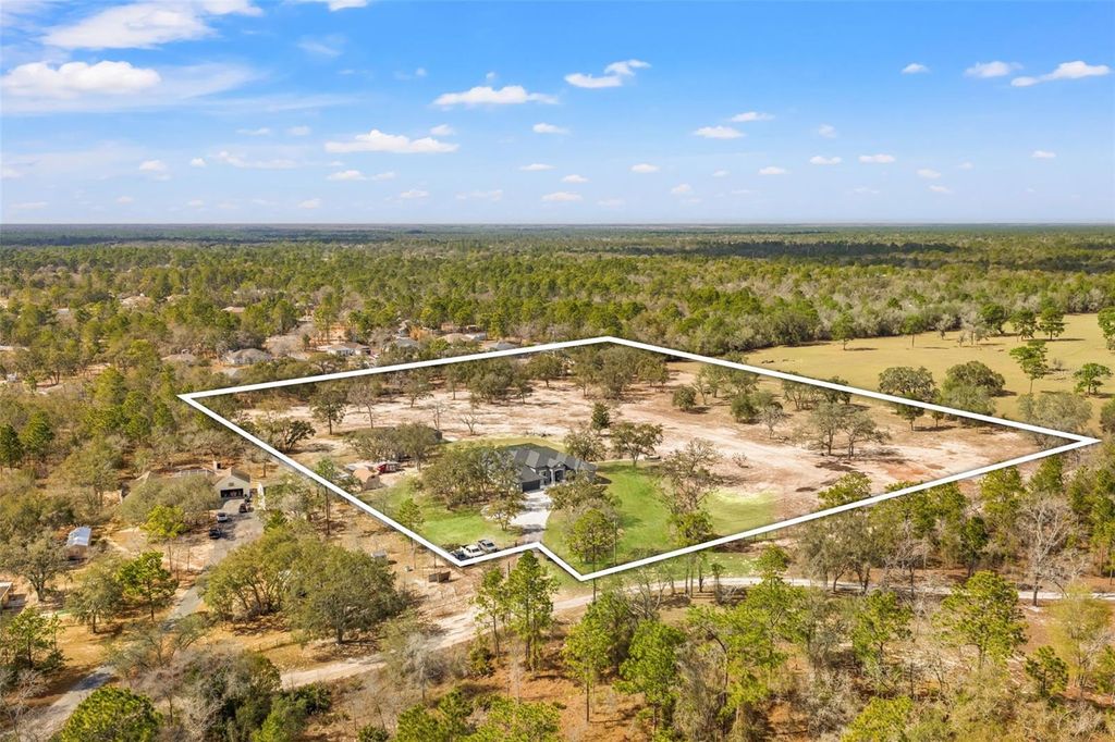 Photo of 12277 Eskimo Curlew Road, Weeki Wachee, FL 34614 (MLS # TB8477352)