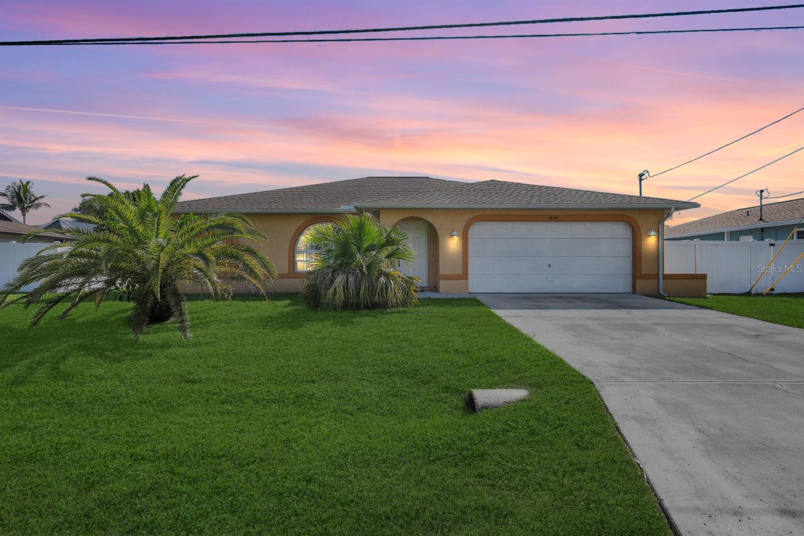 Gulf-Access Waterfront Home with Southern Exposure – Flood Zone X | All Assessments Paid Discover this stunning gulf-access home located along the serene Calabar Canal in South Cape Coral. With southern exposure, this 3-bedroom, 2-bathroom residence is filled with natural light, offering both beauty and comfort. Inside, you’ll appreciate the spacious design, featuring two separate living areas that are perfect for hosting or simply enjoying time with family. The kitchen is equipped with a large window that frames peaceful water views, allowing you to savor the surroundings while cooking. The primary bedroom is a private sanctuary, complete with an ensuite bathroom, walk-in closet, and a built-in vanity. The guest bathroom is conveniently positioned with easy access to the lanai, providing additional privacy and outdoor enjoyment. Sliding pocket doors open the living room to the screened lanai, enhancing the seamless flow between inside and out. Step outside into the fully fenced backyard, ideal for pets and children, and offering plenty of room for future pool installation. Additional features include hurricane shutters for peace of mind, and assessments paid, further streamlining the buying process. The home also resides in Flood Zone X, which can help lower costs by reducing flood insurance requirements. Located minutes from shopping, dining, and entertainment, this home offers the perfect combination of waterfront serenity and convenience. Whether you’re seeking a year-round home, a vacation retreat, or a property ideal for boating enthusiasts, this residence offers it all. Don’t miss out—schedule your private showing today and experience this incredible home for yourself!