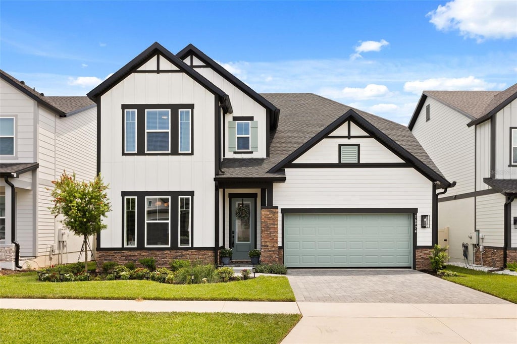 Photo of 16974 Cedar Valley Circle, Clermont, FL 34711 (MLS # O6434156)