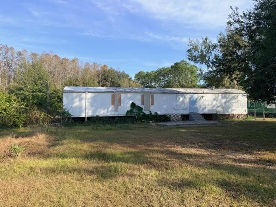 * 3 Bedroom- 2 Bathroom manufactured home on close to 2 acres in Lakeland. * No HOA, NO CDD. The manufactured home on the property needs repair but there is so much potential for this 1.91 acre lot! Please schedule you showing today!