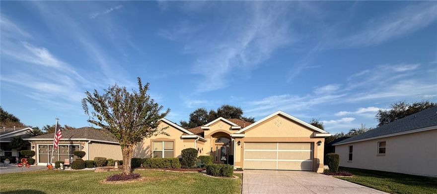 Beautiful Belmont Model with Private Backyard Oasis & NO BOND.  This well-maintained Belmont Model with heated POOL and HOT TUB offers a perfect blend of comfort and outdoor enjoyment - featuring a tiled screened in patio and a separate birdcage.  Located across from the Polo Fields and just steps from Saddlebrook Recreation Center and community pool, this home provides both privacy and convenience in one of the most desirable Villages locations.  Key Features include: Block & Stucco exterior- painted in 2025, Roof (2020), Tankless Gas Water Heater (2019), Gas Fireplace in Living Room, Ductwork Cleaned in 2025 (HVAC & Dryer Vents), Stamped Concrete Driveway – recently sealed, 2 car garage with Epoxy floor & Mature Landscaping.  Inside, you’ll find tile flooring in the main living areas and bathrooms with carpeting in the bedrooms for comfort. This open floor plan features light oak cabinetry in the kitchen and high ceilings throughout, creating a bright & open feel. A solar tube in the guest bathroom adds additional natural light. Electric outlets on upper shelving over two doorways is ideal for seasonal décor displays.  Prime location close to recreation, shopping, dining, and The Villages amenities.