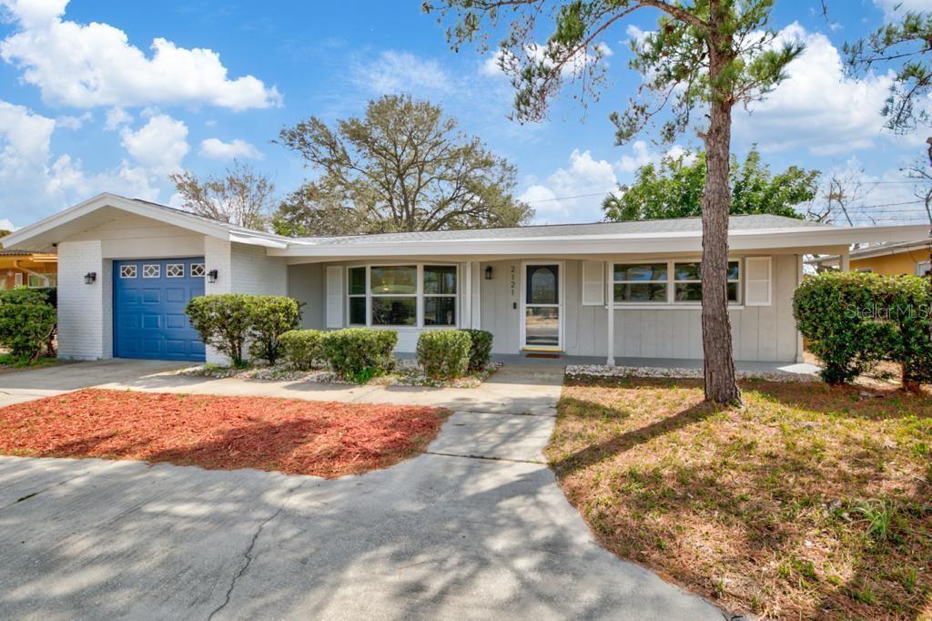 Discover this beautifully maintained 3BR/2BA home in the sought-after Greenbriar community, close to the clubhouse and Garrison-Jones Elementary. The bright, functional floor plan offers a spacious dining area, cozy conversation nook, and an oversized living room with custom built-ins. Recent upgrades provide peace of mind, including a 2022 roof, 2017 A/C, updated plumbing, 2009 permitted electric panel, 2022 impact windows ($30K+),2022 renovated bathrooms, 2022 luxury vinyl waterproof flooring, and modern LED fixtures & faucets. Bedrooms are generously sized with abundant natural light. Parking is no issue with both a garage and semi-circle driveway accommodating up to six vehicles. Step outside and enjoy your own private retreat! The spacious backyard is designed for relaxation and entertaining, featuring a hot tub for unwinding, a fire pit with seating area for gathering under the stars, and a large patio that’s perfect for outdoor dining or weekend barbecues. Surrounded by tropical landscaping and mature trees, this fully fenced yard offers both privacy and a true Florida outdoor lifestyle. HOA is just $210/year and includes access to a pool, clubhouse, fitness center, and game room. Ideally located minutes from Dunedin, Gulf beaches, shopping, dining, and entertainment—this is Clearwater living at its finest! Seller welcomes Cash, Conventional, VA, and FHA offers. Schedule your showing today!