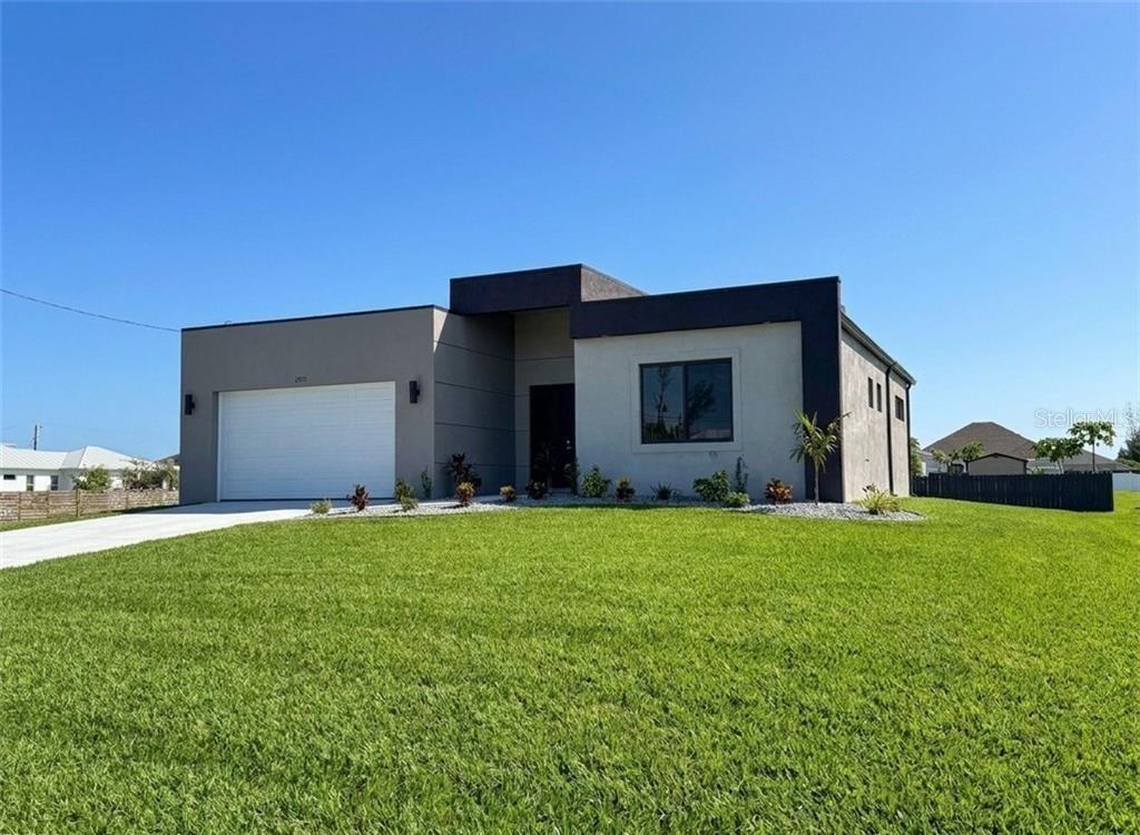 Photo of 2325 NW 37th Place, Cape Coral, FL 33993 (MLS # O6443895)