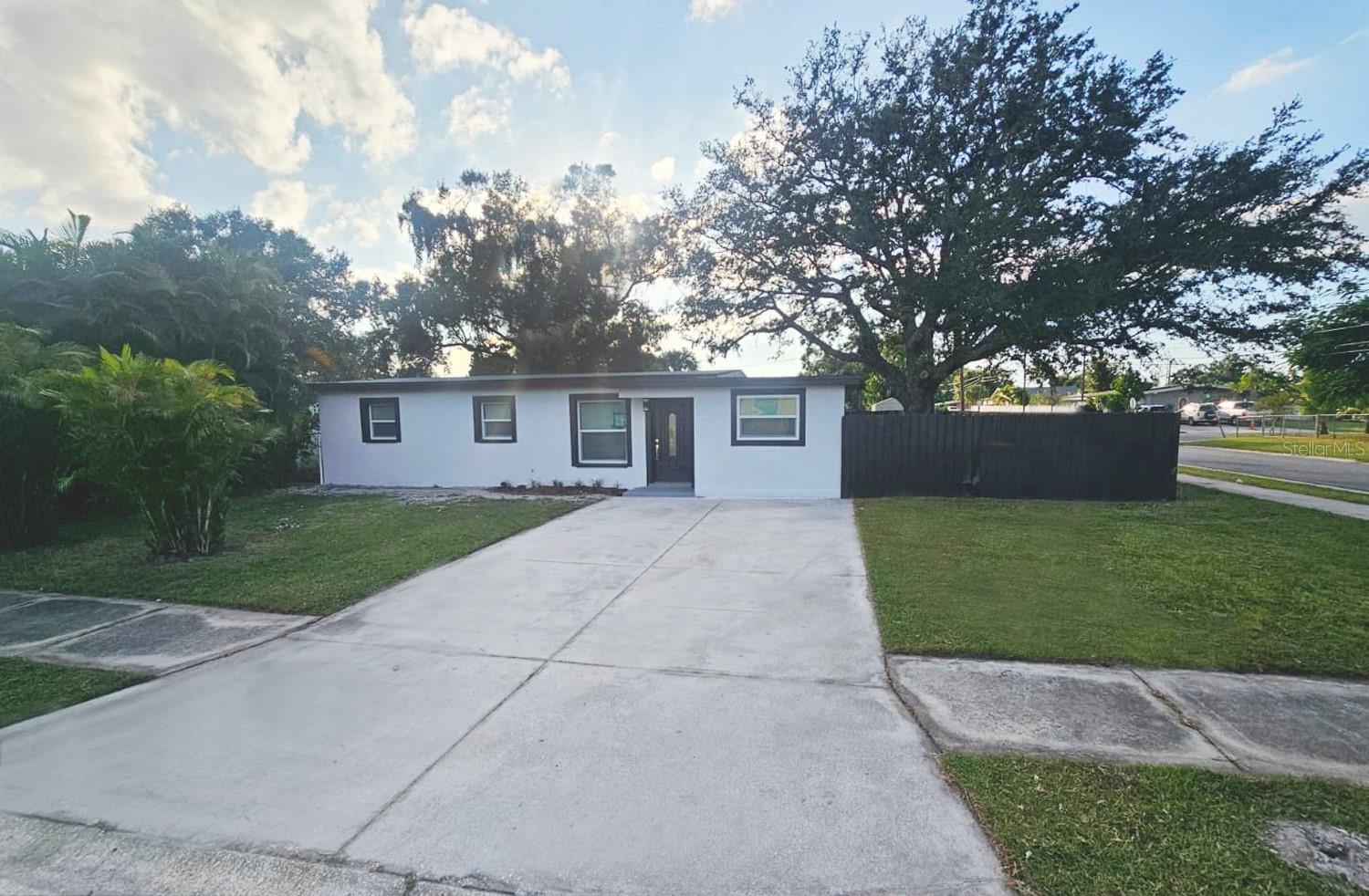 Fantastic opportunity to own a centrally located home in Tampa—just minutes from Raymond James Stadium, the Tampa international Airport, and Hillsborough Community College.
This beautifully remodeled 4-bedroom, 2-bath home offers everything you've been looking for and more — no HOA , fenced-in backyard! Step inside to find an updated kitchen featuring wood cabinetry, sleek granite countertops, new appliances. Throughout the home, you’ll enjoy easy-to-maintain wood vinyl flooring. The primary suite includes its own private bath with a walk in shower for added comfort and convenience. Need extra storage? This home has you covered with a utility room that offers washer/dryer hookups