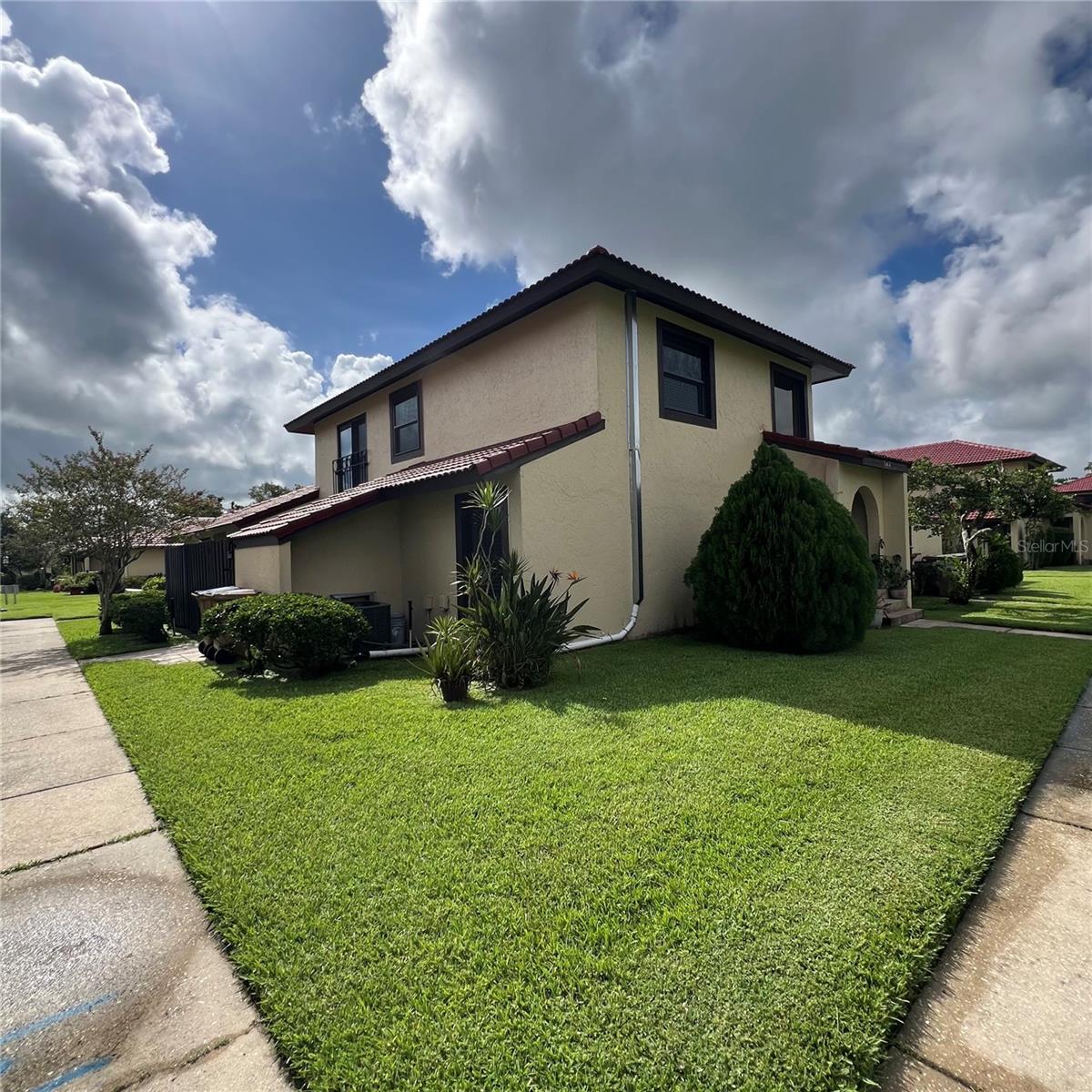 Beautiful and Spacious 3-Bedroom Townhouse with 1,586 Sq Ft in the Heart of Kissimmee! Welcome to this stunning 3-bedroom, 2-bathroom townhouse offering 1,586 square feet of thoughtfully designed living space in the highly sought-after Poinciana community of Kissimmee, FL. Step inside and be greeted by a bright, open floor plan that seamlessly connects the living, dining, and kitchen areas—perfect for both entertaining guests and enjoying quiet family evenings. The main living areas feature elegant tile flooring, providing durability and easy maintenance, while the bedrooms are comfortably carpeted for warmth and relaxation. The kitchen boasts ample cabinet storage, generous countertop space, and sliding glass doors that open to a private courtyard patio—an ideal spot for morning coffee, outdoor dining, or simply unwinding in your own serene outdoor space. The spacious master bedroom includes a large closet and an en-suite bathroom for added privacy and convenience. Two additional bedrooms share a well-appointed full bathroom, offering plenty of room for family, guests, or a home office.Enjoy year-round comfort with central heating and air conditioning, ensuring a pleasant environment no matter the season. Additional features include an attached garage for secure parking and extra storage, a fenced backyard for privacy and outdoor activities, and access to community amenities including a sparkling swimming pool, tennis courts, and scenic walking paths. This home is conveniently located close to shopping centers, dining options, quality schools, parks, and major highways, providing easy access to everything you need. Whether you’re a first-time homebuyer, downsizing, or looking for a great investment property, this townhouse offers a perfect blend of comfort, convenience, and community. Don’t miss this opportunity to own a beautiful home in one of Kissimmee’s most welcoming neighborhoods. Schedule your private showing today and experience all that this charming property.