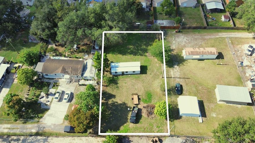 This 0.32-acre lot is all about possibilities. With plenty of room to build or develop, it gives you the freedom to shape the property into whatever fits your vision—whether that’s a personal project or an investment play. The lot currently has a manufactured home on-site, which is being sold separately from the land, offering an optional add-on depending on your plans and needs. Zoned and approved by the county for a single-family home, mobile home, duplex, or triplex, the versatility here makes it ideal for investors, future homeowners, or anyone looking to get creative with their build. Prime location just minutes from MCO, Florida Mall, Disney, Universal Studios, plus endless shopping, dining, and entertainment—aka one of Orlando’s most active and desirable areas.