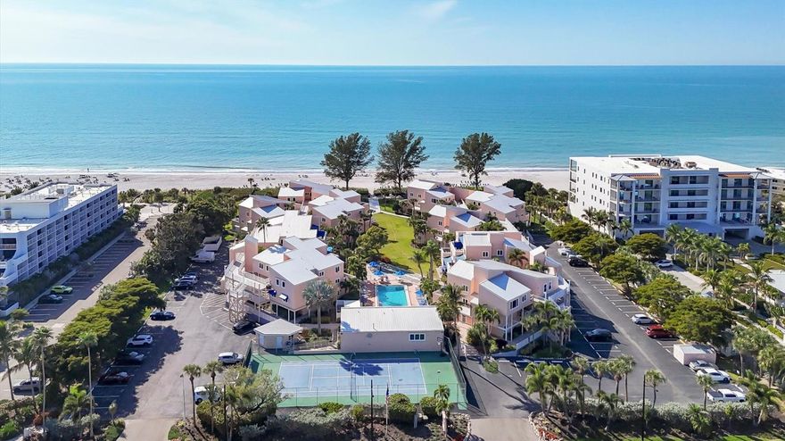 Welcome to Sand Cay Beach Resort—one of Longboat Key’s premier vacation destinations. This rarely available third-floor condo truly impresses with soaring vaulted ceilings exclusive to top-floor residences, a beautifully updated kitchen, and tasteful coastal-inspired finishes throughout. A well-established vacation rental with a strong income history, this property is an ideal opportunity for both personal enjoyment and investment. Nestled within an intimate beachfront community offering 340 feet of pristine Gulf frontage, Sand Cay provides an exceptional resort-style experience. Residents and guests enjoy first-class amenities including tennis courts, shuffleboard, a heated pool, basketball area, barbecue stations, a full-time on-site manager, and a convenient in-house rental program. Perfectly located, the resort is just minutes from the boutique shops and fine dining of St. Armands Circle and the vibrant arts and cultural attractions of downtown Sarasota. Light and bright, this third-floor garden-view condo is ideally situated between the pool and the beach. The inviting floor plan features two bedrooms, two bathrooms, a spacious living and dining area, an updated and fully equipped kitchen, a cozy den/office nook, and a private balcony with an awning—ideal for morning coffee or unwinding after a day by the Gulf. Your slice of Longboat Key paradise awaits. Schedule your showing today.