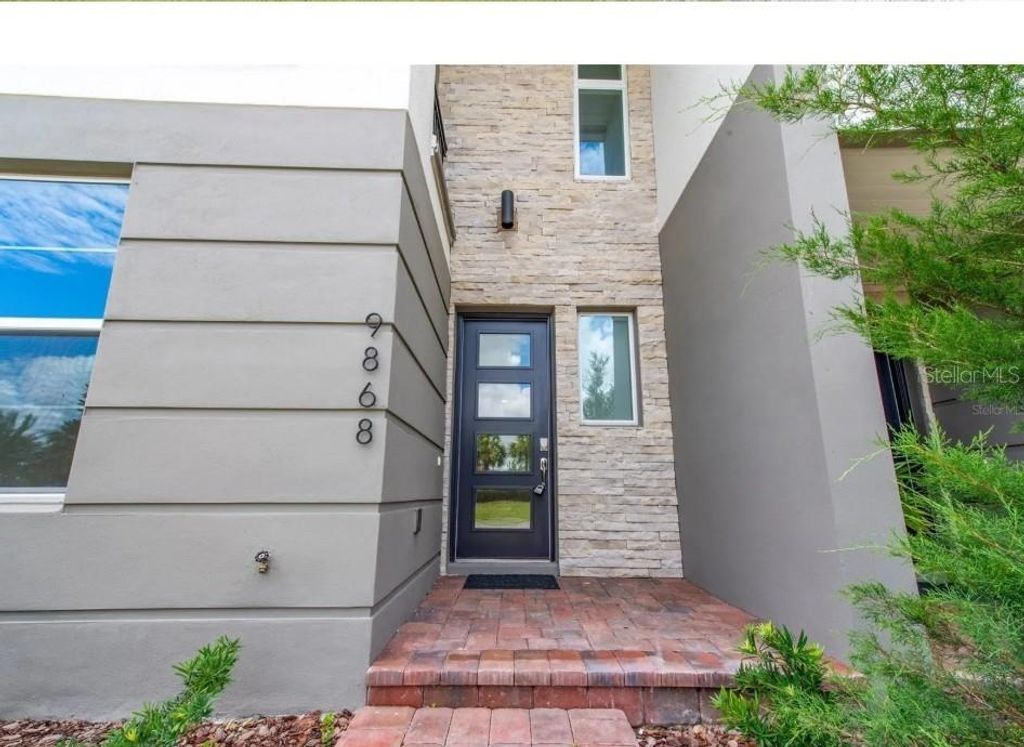 Photo of 9868 Bucklow Hill Drive, Orlando, FL 32832 (MLS # O6395934)