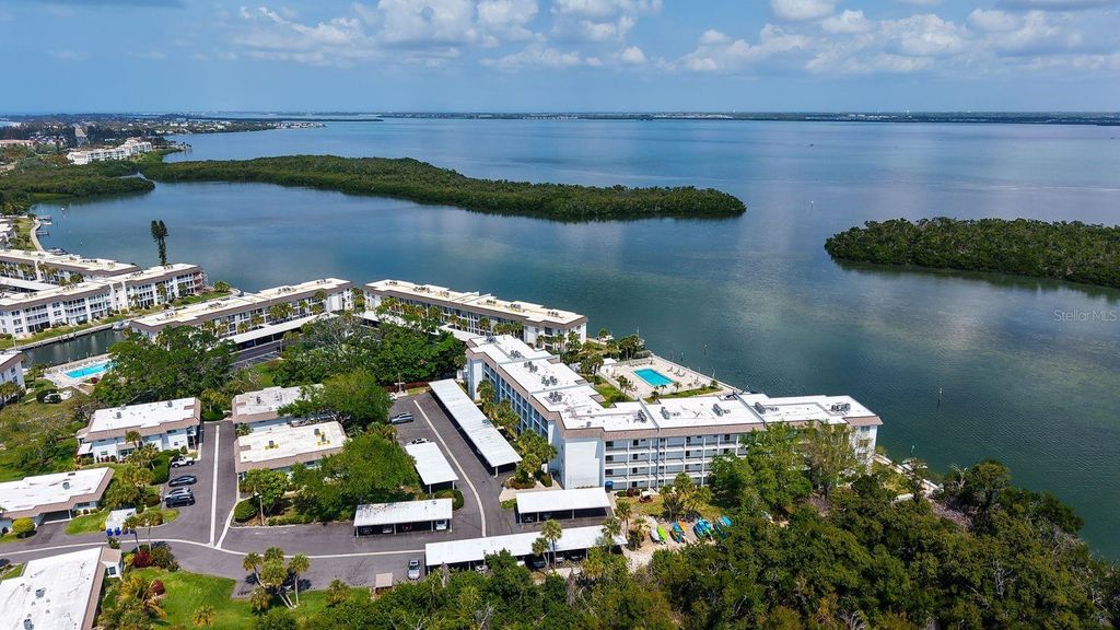 Photo of 605 Sutton Place #201, Longboat Key, FL 34228 (MLS # A4687586)