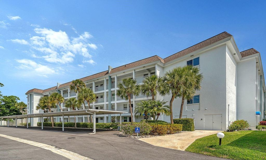 Photo of 605 Sutton Place #201, Longboat Key, FL 34228 (MLS # A4687586)