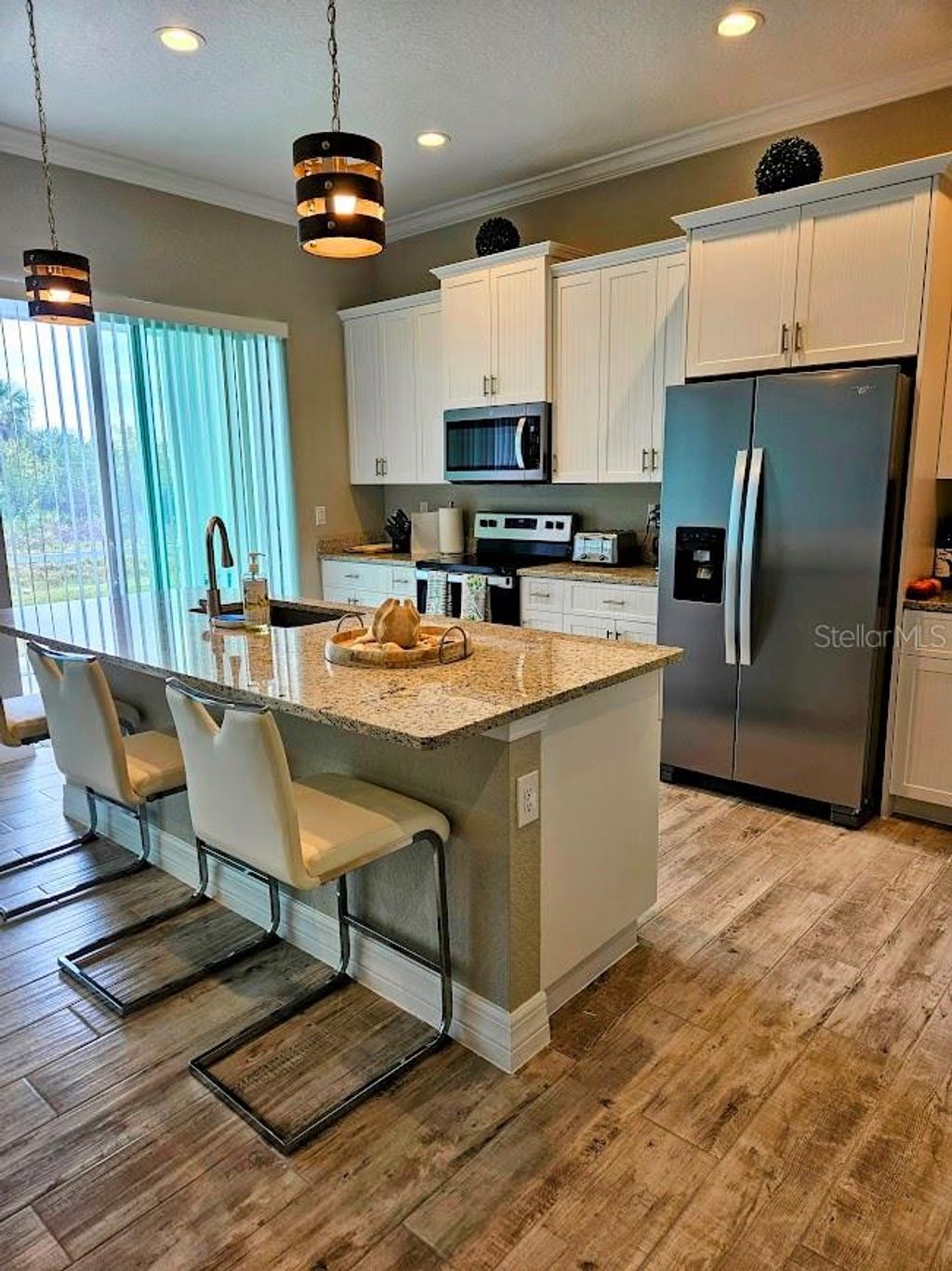 Photo of 372 Baytree Drive, Rotonda West, FL 33947 (MLS # C7487044)