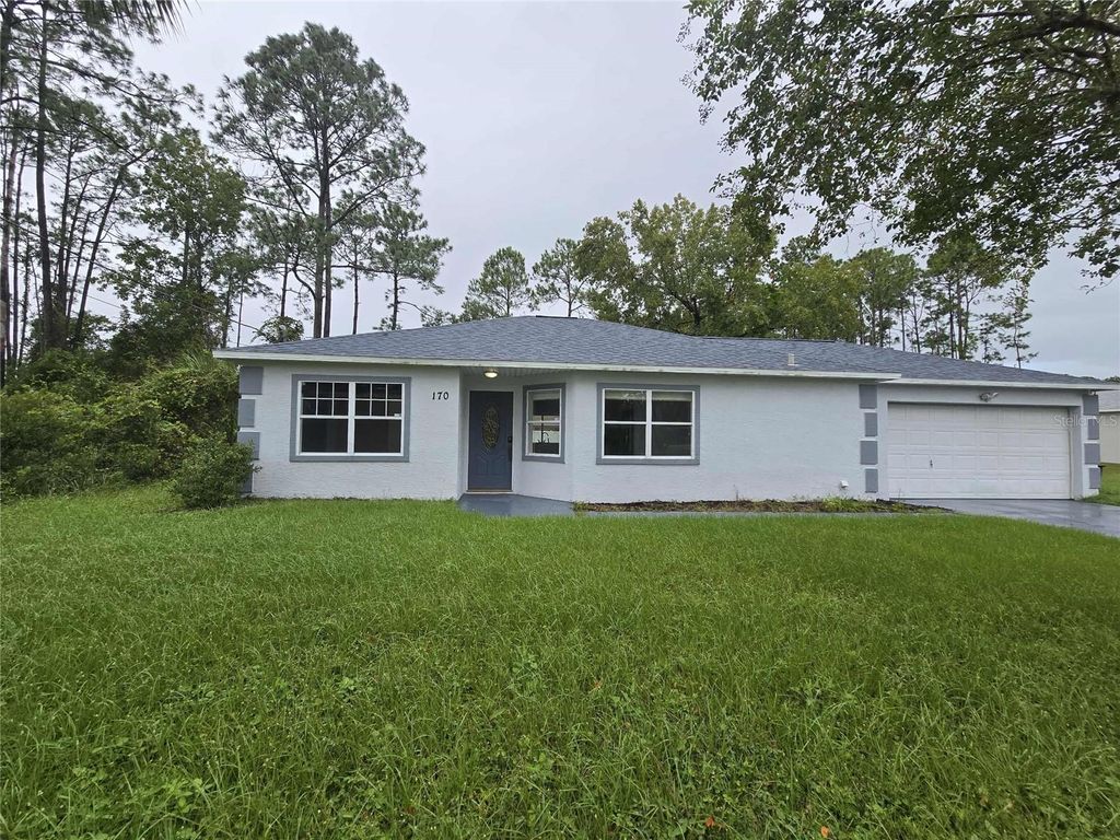Photo of 170 Point Pleasant Drive, Palm Coast, FL 32164 (MLS # FC313224)