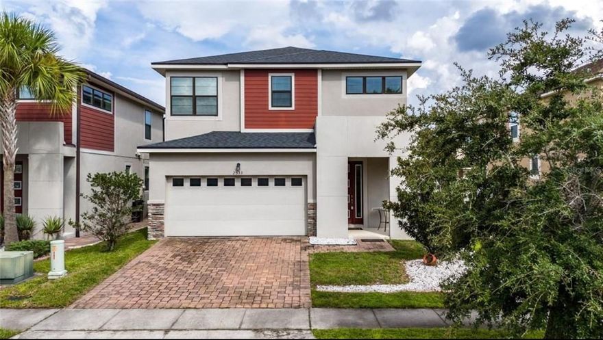 Immaculate home in a desirable gated & man-guarded community in the heart of Kissimmee, just minutes from The Loop Mall, schools, shopping centers, and Orlando’s top attractions. The first floor features an open concept with living, dining, and kitchen areas and half bath. The kitchen includes 42” cabinets, quartz countertops, stylish backsplash, and stainless steel appliances. Upstairs you’ll find all bedrooms, a loft with open views, and a convenient laundry room. The owner’s suite offers a garden tub, separate shower, and double vanity with quartz countertops. Enjoy a private rear porch and a rear-entry two-car garage.