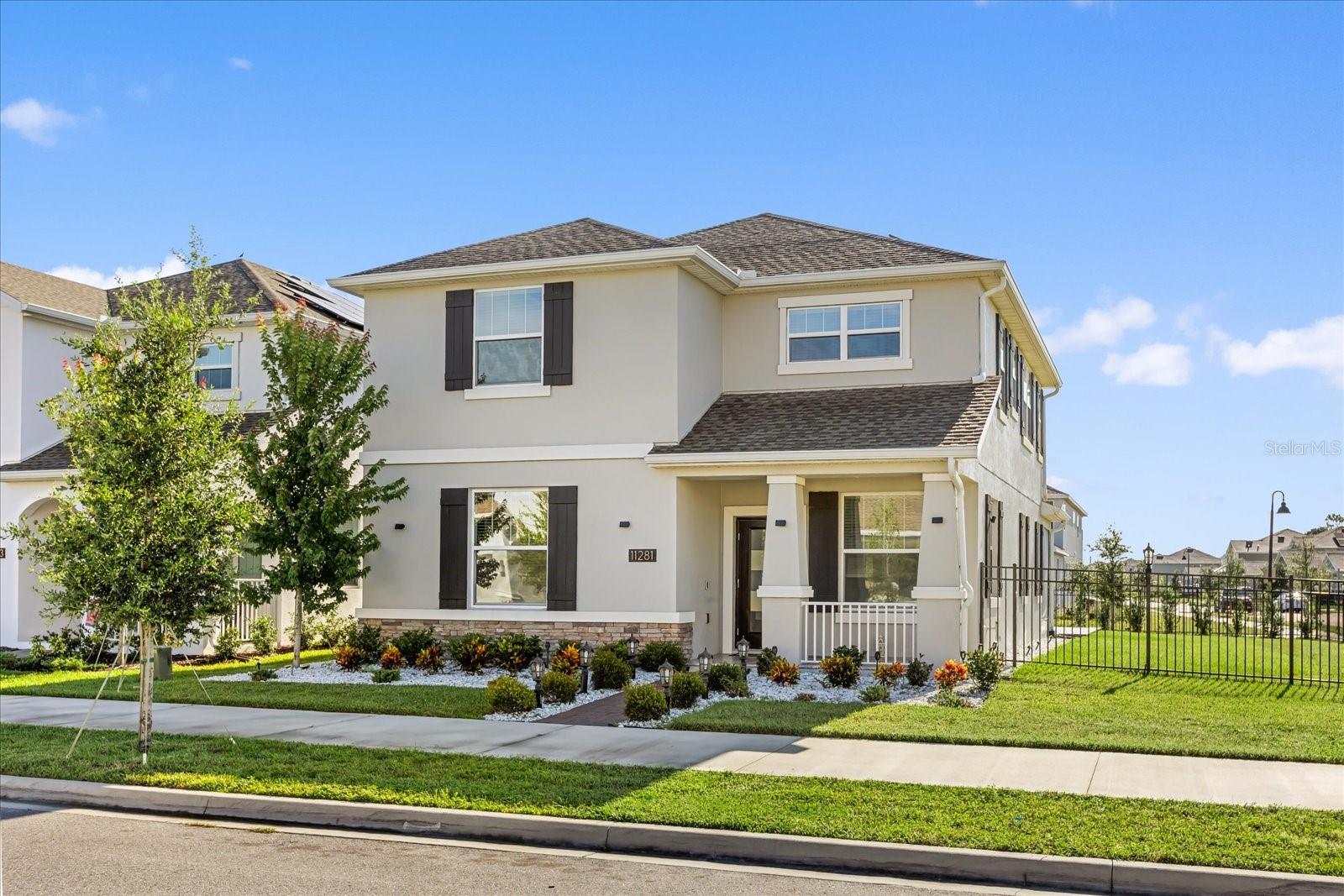 In the heart of Lake Nona’s sought-after Storey Park community, this 2023-built corner-lot home combines elegance with everyday comfort. The first floor offers a versatile layout — formal living area, private office/den, one bedroom with a full bath, laundry room, and an open-concept kitchen, dining, and family room designed for seamless connection. The kitchen boasts quartz countertops, a huge island with bar seating, LED lighting, and stainless steel appliances overlooking the main living space. Sliding doors lead to the covered, screened patio where you can enjoy Florida’s sunshine without the bugs or rain.
Upstairs, a spacious loft/bonus area offers flexibility for a playroom, media lounge, or reading retreat. The primary suite features a tray ceiling, walk-in closet, and spa-style en-suite with double sinks, soaking tub, separate shower, and private water closet. Three additional bedrooms and a third full bath complete the second level. The oversized corner lot, one of the largest in the neighborhood, provides ample space for outdoor games, gardening, or adding a pool and/or spa.
This energy-efficient home includes solar panels and sits within a community rich in amenities: resort-style pool, 24-hour fitness center, playgrounds, dog parks, basketball and volleyball courts. HOA fees include cable TV and fiber-optic internet. Ideally located just minutes from Lake Nona Medical City, the airport, theme parks, shopping, dining, and top-rated schools, this home offers the best of modern living in one of Orlando’s most desirable areas.
