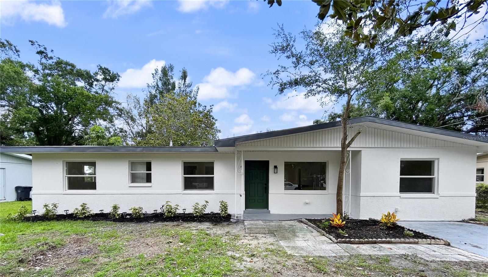 Welcome to this stunning, fully renovated 3-bedroom, 2-bathroom home located in the highly desirable community of Oldsmar Country Club Estates. Nestled on a spacious 0.21-acre lot with no HOA, this waterfront property offers the perfect blend of luxury, comfort, and Florida charm. As you approach the home, you’ll be captivated by its beautiful curb appeal, complete with manicured landscaping and a welcoming exterior. Step inside to discover luxury vinyl tile flooring that flows throughout the living spaces, creating a warm and modern atmosphere.
The renovated kitchen is designed for both function and style, featuring brand-new stainless steel appliances, sleek quartz countertops, and ample cabinetry. Natural light pours into each bedroom through large windows, giving the home an open and airy feel. The primary suite includes a beautifully updated bathroom with a modern vanity, designer lighting, and a tiled stand-up shower that adds a spa-like touch. A door from the living area leads directly to the expansive backyard, where you can enjoy peaceful waterfront views. With plenty of room for entertaining, family gatherings, or simply relaxing and watching the sunset, this outdoor space is truly special. Located near parks, dining, golf, and top-rated schools, this home offers the rare combination of waterfront living, modern updates, and no HOA in one of Oldsmar’s most established neighborhoods.