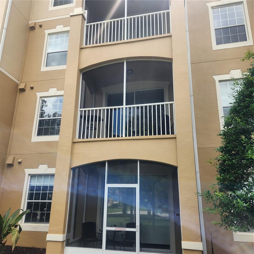 Photo of 7664 Comrow Street #202, Kissimmee, FL 34747 (MLS # O6439873)