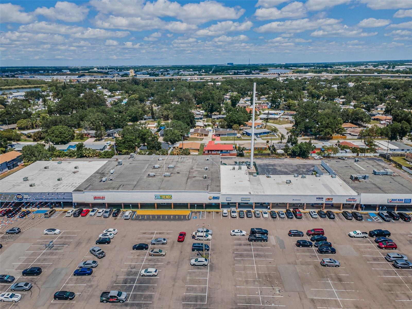 Unlock the potential of your business with this prime commercial space for lease, ideally located just minutes from Downtown Tampa and offering unmatched accessibility to Port Tampa Bay, Adamo Drive, Brandon, Ybor City, the Crosstown Expressway, and I-4. Positioned in a historic area near the scenic Palm River and Palm River Canal, this versatile property offers the ideal setting for a cafe, retail, office, salon, medical, legal, or financial services—truly endless possibilities.
With abundant parking and excellent walkability, this location draws in a steady flow of foot traffic. High-profile neighbors like the Seminole Hard Rock Hotel & Casino and the Florida State Fairgrounds bring even more visibility and consumer activity to the area, especially during peak event seasons.
The surrounding community features a vibrant blend of commercial and light industrial businesses, generating strong lunch and after-hours traffic. Residential density is also impressive, with over 1,500 rooftops within one mile and more than 5,000 within five miles—providing a robust base of potential patrons.
Offering space, convenience, and a dynamic location, this property is a rare opportunity for any business looking to grow and achieve long-term success in the heart of Tampa.
