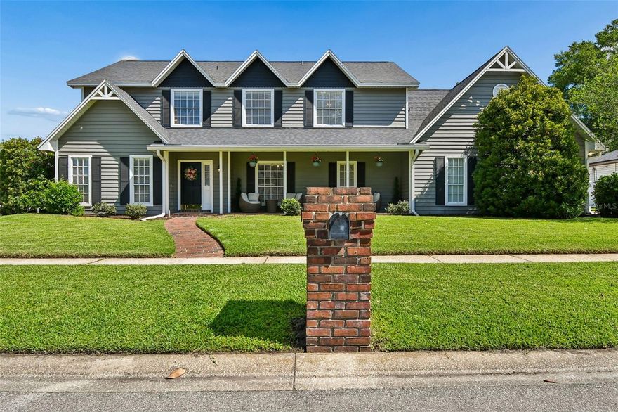 Beautifully inviting custom home in sought-after Conway Place neighborhood, this is one you won’t want to miss! Enjoy private access to the Conway Chain of Lakes via the neighborhood boat ramp on Little Lake Conway, just a short distance away, along with a tennis/pickleball court, a playground and low HOA. This spacious four-bedroom, 2.5-bath home with over 2,800 square feet offers exceptional curb appeal, highlighted by a charming brick front porch, the ideal place to relax and connect with neighbors. Inside, a gracious foyer opens to light-filled living and dining spaces that feel warm and welcoming from the moment you enter. The beautifully appointed kitchen is ideal for entertaining or everyday living, featuring granite countertops, solid wood cabinetry, stainless steel appliances and island seating, all flowing seamlessly into a sunny breakfast area with a lovely bay window overlooking the expansive fenced backyard. Complete with a charming brick patio and ample room to create your dream pool oasis, this outdoor space offers endless possibilities. The family room serves as the heart of the home, anchored by a wood-burning brick fireplace and offering direct access to the backyard for effortless indoor-outdoor living. Upstairs, the generous private primary suite is a retreat, featuring a walk-in closet and a renovated en-suite bath with dual sinks and a walk-in shower. Three additional spacious bedrooms, all with walk-in closets, provide comfort and flexibility. Additional highlights include a large attic, oversized two-car garage, a laundry room with abundant storage and a convenient laundry chute, Tesla charger, new interior paint, new plumbing (2023), roof (2018), HVAC (2019), water heater (2019) and a new washing machine. Zoned for highly regarded Pershing K-8 School and Boone High School, with convenient access to downtown Orlando and Orlando International Airport. Homes offering this rare combination of space, location and exceptional community amenities are sought after. Don’t miss this incredible opportunity and schedule your private tour today.