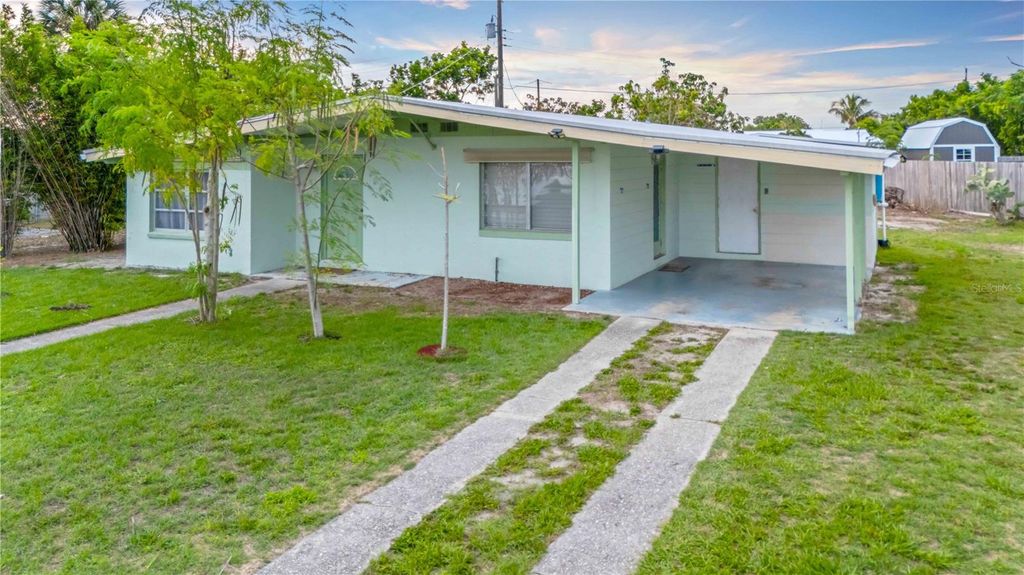 Photo of 180 Palmetto Circle NE, Port Charlotte, FL 33952 (MLS # C7511661)