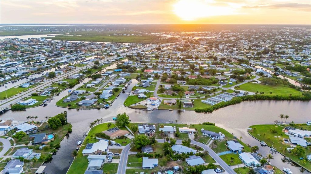 Photo of 180 Palmetto Circle NE, Port Charlotte, FL 33952 (MLS # C7511661)