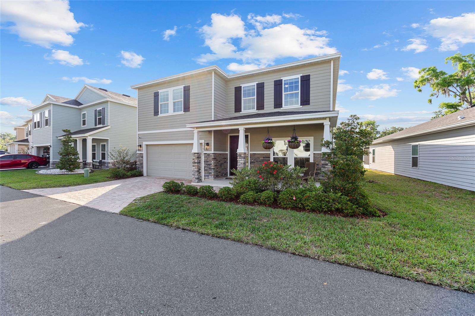 Welcome to the New Home in Arbor Greens, a stunning residence located in the vibrant community of Newberry, FL. This home boasts four spacious bedrooms and three full bathrooms, offering ample space for comfort and relaxation. The open floor plan, complemented by stainless steel appliances, creates a modern and inviting atmosphere. The home also features a two-car garage, providing plenty of storage and parking space. The screened patio is perfect for enjoying the Florida weather, while the community pool offers a refreshing escape on hot summer days. The home also includes a bonus room, a front porch, and a butler pantry, adding to its charm and functionality. The laundry room comes equipped with a washer and dryer, making laundry day a breeze. The custom primary closet offers ample storage space, while the home office provides a quiet space for work or study. Lawn care is included, ensuring your home always looks its best. Experience the perfect blend of comfort, convenience, and luxury at the New Home in Arbor Greens.